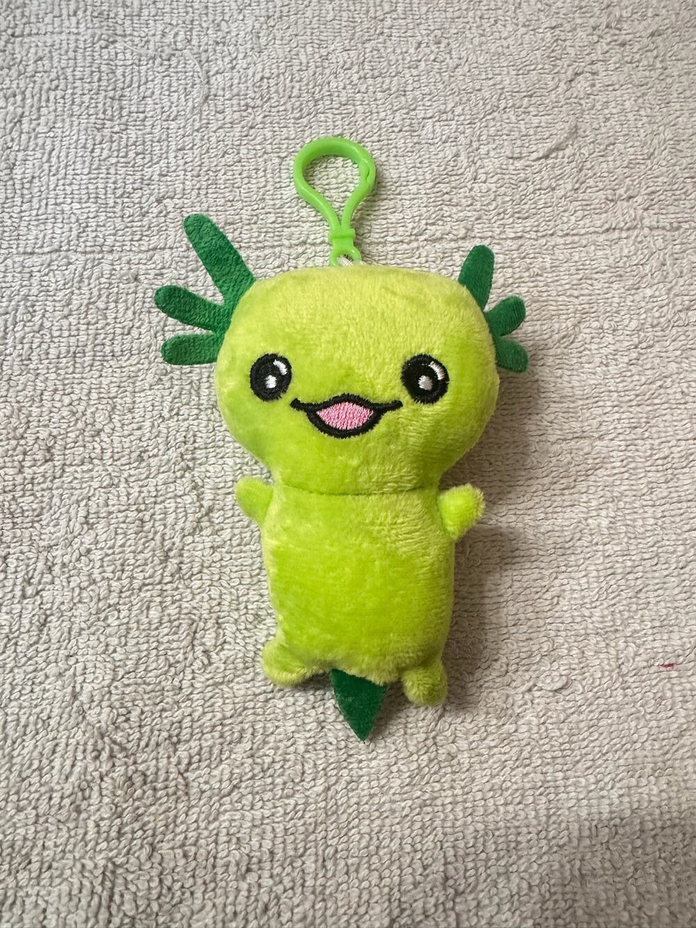 Green axolotl plush keychain bag charm with cute face and dark green gills